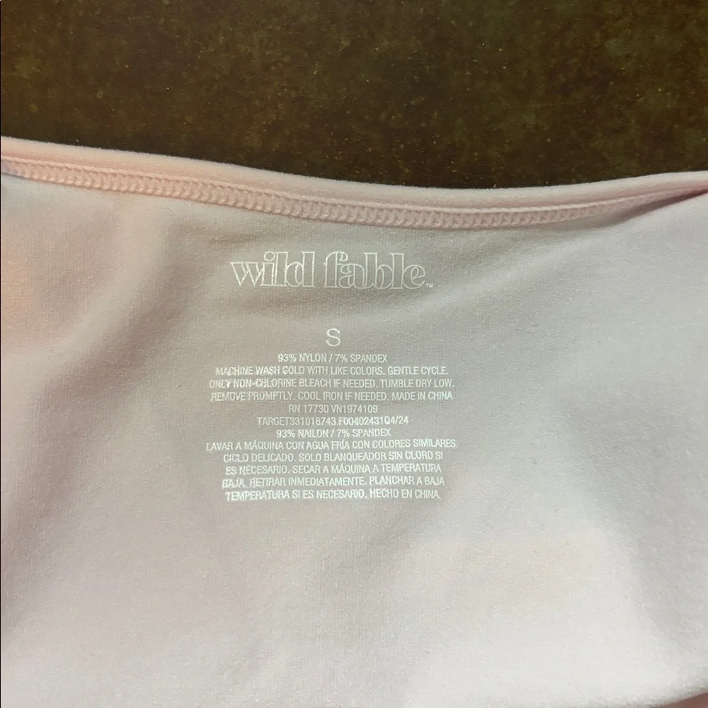 Women's light pink backless top size small never worn